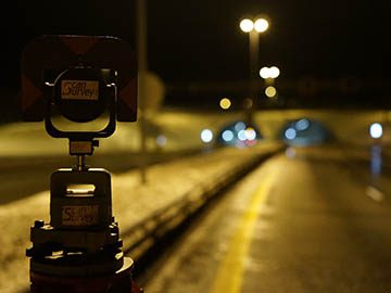 prism used for fixed mark measurements on a road at night