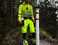 Scan survey staff member using a total station